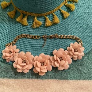 Light pink flower shape necklace.